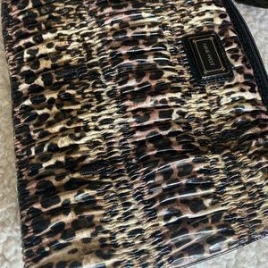 Large Nine West clutch type bag with zipper enclosure. NWT red inside lining